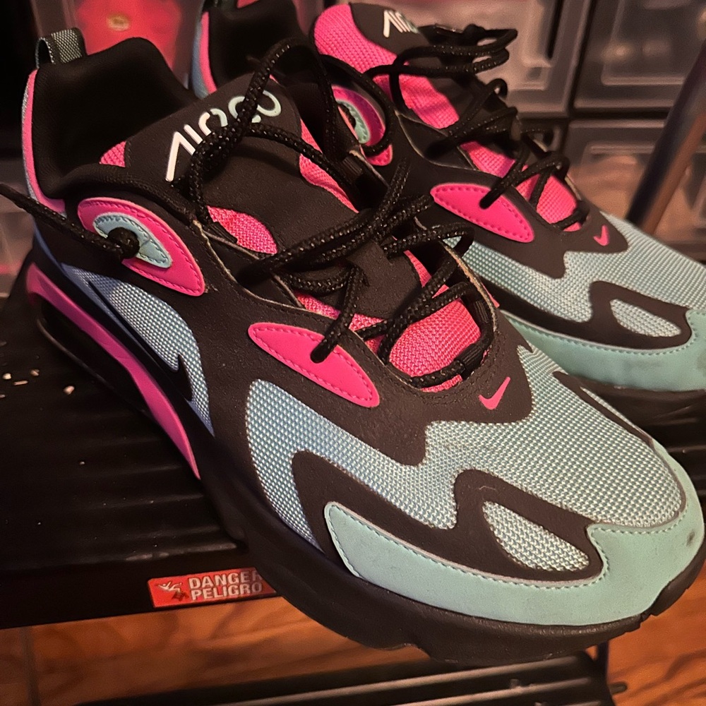 Nike Sneakers in Black, Pink, and Teal